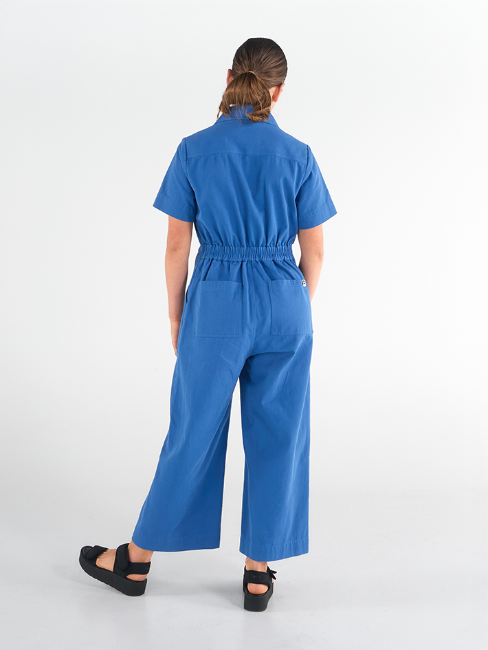 Back view of Stella Jumpsuit in Blue Lagoon blue cotton, relaxed fit, Sydney design.