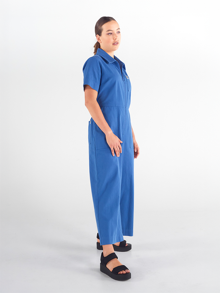 Side view of Stella Jumpsuit in Blue Lagoon blue cotton, relaxed fit, Sydney design.