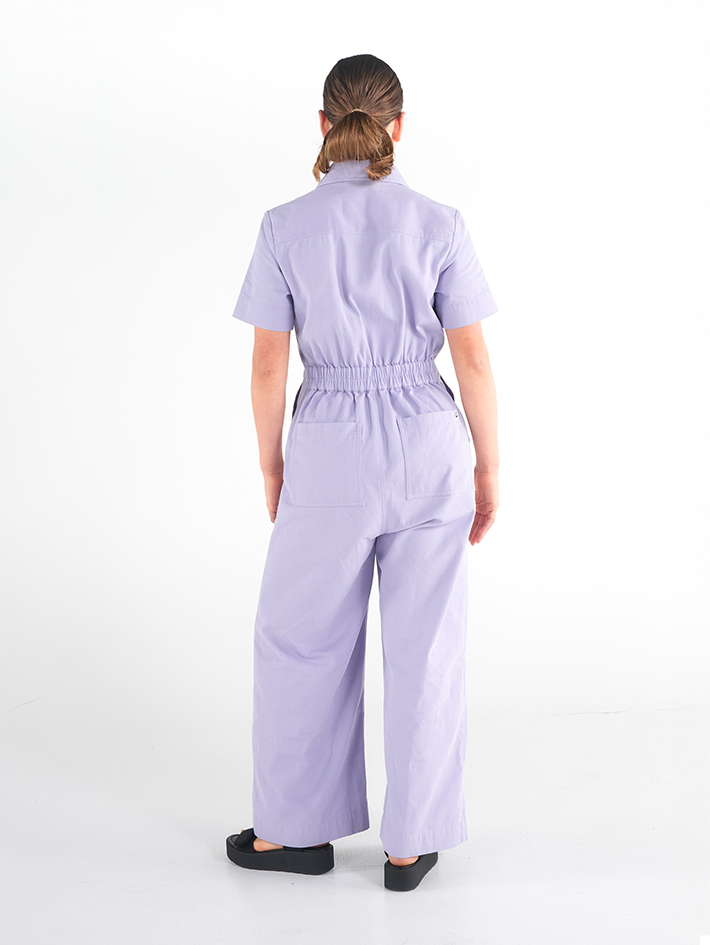 Back view of Stella Jumpsuit in Periwinkle purple cotton, relaxed fit, Sydney design.