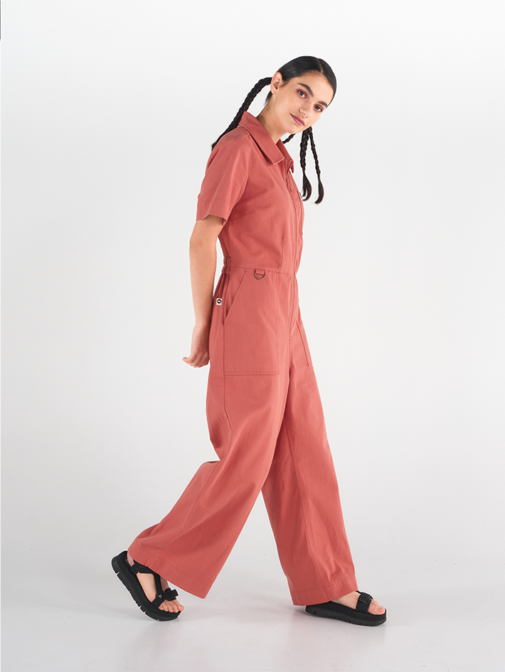 Side view of Stella Jumpsuit in Terracotta Red cotton, relaxed fit, Sydney design.
